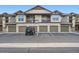 Exterior view of an apartment complex with a 4-car garage at 7462 S Quail Cir # 426, Littleton, CO 80127