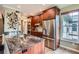 Modern kitchen with stainless steel appliances, granite countertops, and ample cabinet space at 7462 S Quail Cir # 426, Littleton, CO 80127
