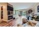 Inviting living room with a fireplace and open access to the kitchen and balcony at 7462 S Quail Cir # 426, Littleton, CO 80127