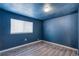 Bedroom featuring new floors, neutral paint, and ample natural light at 6500 E 88Th Ave # 258, Henderson, CO 80640