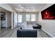 Comfortable living room with new floors, neutral paint, and ample natural light at 6500 E 88Th Ave # 258, Henderson, CO 80640