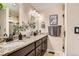 Bathroom features double sinks, granite countertops, and modern fixtures at 3047 Osceola St, Denver, CO 80212