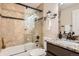 Beautiful bathroom featuring a granite countertop and a bathtub with shower at 3047 Osceola St, Denver, CO 80212