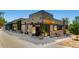 Modern restaurant exterior with large glass windows and outdoor seating at 3047 Osceola St, Denver, CO 80212