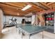 Spacious basement featuring a ping pong table and exercise equipment at 5215 S Jebel Way, Centennial, CO 80015