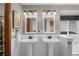 Bright bathroom features dual vanities and modern fixtures at 5215 S Jebel Way, Centennial, CO 80015