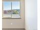 Bedroom with window showing mountain and city views at 12983 W Ida Ave # 301, Littleton, CO 80127