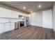 Modern kitchen with white cabinets and stainless steel appliances at 12983 W Ida Ave # 301, Littleton, CO 80127