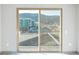 View from sliding glass doors to balcony and cityscape at 12983 W Ida Ave # 301, Littleton, CO 80127