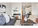 Cozy living room blending seamlessly with an open kitchen and dining area at 2958 Syracuse St # 306, Denver, CO 80238