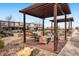 A community pergola and seating area at 2958 Syracuse St # 306, Denver, CO 80238