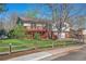 Charming home featuring a spacious deck and well-maintained front yard at 7065 S Willow St, Centennial, CO 80112