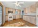Bright kitchen with stainless steel appliances and ample cabinet space at 7065 S Willow St, Centennial, CO 80112
