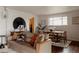 Bright and modern living room transitioning into the dining area, with stylish decor and ample natural light at 6530 W 26Th Ave, Edgewater, CO 80214