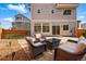 Cozy patio area with outdoor seating, perfect for relaxing and entertaining in the backyard at 10123 Zeno St, Commerce City, CO 80022
