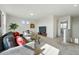 Comfortable living room with modern furniture, stylish decor, and ample natural light for a welcoming space at 10123 Zeno St, Commerce City, CO 80022