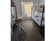 Bedroom featuring a bunk bed, hardwood floors, and ample natural light at 305 Strong St, Brighton, CO 80601