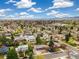 Aerial view of a peaceful neighborhood showcasing tree-lined streets and well-kept properties at 882 E Briarwood Cir, Centennial, CO 80122
