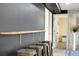 Basement area with bar seating and convenient access to doorways and other rooms at 882 E Briarwood Cir, Centennial, CO 80122