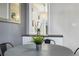 Intimate dining area featuring a round table, stylish chairs, and a decorative plant at 882 E Briarwood Cir, Centennial, CO 80122