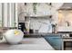 Bright kitchen featuring marble backsplash, stainless steel sink, and modern faucet at 882 E Briarwood Cir, Centennial, CO 80122