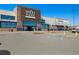 Exterior view of the Whole Foods Market with ample parking and convenient shopping at 882 E Briarwood Cir, Centennial, CO 80122