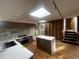Modern kitchen with updated island, sleek countertop, and stylish backsplash, perfect for cooking and entertaining at 6838 Harvest Rd, Boulder, CO 80301