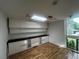 Bright room featuring modern cabinets, wooden countertops, hardwood floors, and a skylight for ample natural light at 6838 Harvest Rd, Boulder, CO 80301