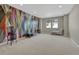 Spacious bonus room with ample natural light, perfect for a variety of activities or uses at 14667 Crouch Pl, Parker, CO 80134