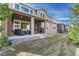 Back covered patio featuring outdoor furniture, a grill, and views of the private yard at 14667 Crouch Pl, Parker, CO 80134