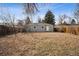 Private backyard featuring lush greenery, offering a serene outdoor retreat for relaxation and enjoyment at 1734 Kingston St, Aurora, CO 80010