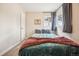Quaint bedroom with ample natural light and cozy decor at 1734 Kingston St, Aurora, CO 80010