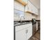 Bright kitchen with stainless steel appliances, granite countertop, and modern fixtures at 1734 Kingston St, Aurora, CO 80010