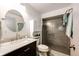 Bathroom with a modern vanity, updated fixtures, and walk-in shower at 530 Windmill Rd, Castle Rock, CO 80108