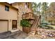 Close up of entrance showing stone accents, wood staircase and deck at 530 Windmill Rd, Castle Rock, CO 80108