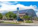 The exterior of the Wings Over the Rockies Air & Space Museum, featuring a prominent rocket sculpture at 7430 E Bayaud Ave, Denver, CO 80230