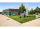 Schlessman Gathering Branch Library featuring a modern design with a brick facade and large glass windows at 7430 E Bayaud Ave, Denver, CO 80230