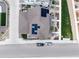 Aerial view of home showcasing its solar panels, manicured landscaping, and roof at 9804 Rosalee Peak St, Littleton, CO 80125