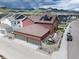 Aerial view of home, highlighting solar panels, garage, and backyard patio area at 9804 Rosalee Peak St, Littleton, CO 80125