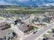 Aerial view of a neighborhood with well-maintained landscaping and a mountain view at 9804 Rosalee Peak St, Littleton, CO 80125