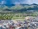 A beautiful aerial view of the neighborhood nestled near scenic mountains at 9804 Rosalee Peak St, Littleton, CO 80125