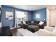 Comfortable living room with stylish décor, plush seating, and great natural light at 9804 Rosalee Peak St, Littleton, CO 80125