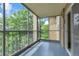 Screened-in balcony offering tree-filled views and ample natural light at 13606 E Bates Ave # 304, Aurora, CO 80014