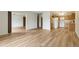Spacious open concept living room flowing into a well-lit kitchen at 13606 E Bates Ave # 304, Aurora, CO 80014