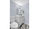 Well-lit bathroom features a vanity, modern fixtures, and clean, minimalist design at 2281 Vaughn # 104A, Aurora, CO 80014
