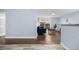 Spacious living room featuring hardwood floors, comfortable seating, and a sliding glass door at 2281 Vaughn # 104A, Aurora, CO 80014