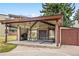 Community picnic area featuring covered seating, picnic tables, and a barbecue grill at 2281 Vaughn # 104A, Aurora, CO 80014