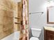 Bathroom featuring a shower/tub combo with decorative tile and modern fixtures at 421 E Highline Cir, Centennial, CO 80122