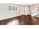 Bright living room featuring hardwood floors, neutral paint, window, and a welcoming ambiance at 421 E Highline Cir, Centennial, CO 80122