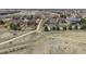 Aerial view showcasing the location of the houses and the paths to the open fields and nearby schools at 22475 E Hidden Trail Dr, Parker, CO 80138